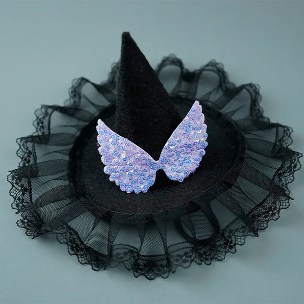 Black Halloween Witch Hat Collection with sheer black lace and blue sequin wings on a light gray background