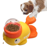 Dog playing with Interactive Treat Dispenser Toy for Dogs on a white background