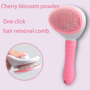 Pink Pet Grooming Brush with One Click Hair Removal showing easy hair disposal mechanism