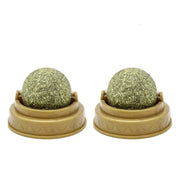 Two green Catnip Ball Toy in beige holders with '2PCS' text above on a white background