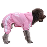 Small dog wearing a pink Sporty Pet Hoodie Jumpsuit with white stripes on a white background