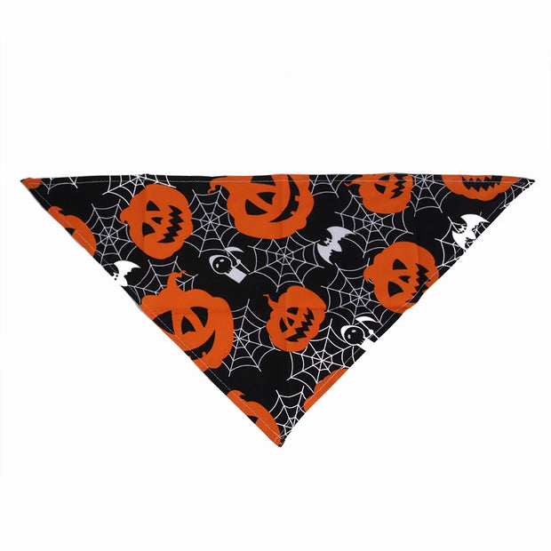 Halloween Pet Hat And Drool Towel Set triangle bandana with pumpkins and cobwebs on a black background