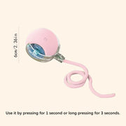 Pink Automatic Obstacle Avoidance Pet Toy Ball magnifying glass with a retractable cord on a white background