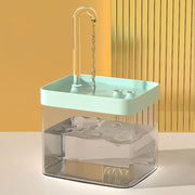 Portable Modern Pet Water Fountain sink with clear base and green top against a yellow wall.