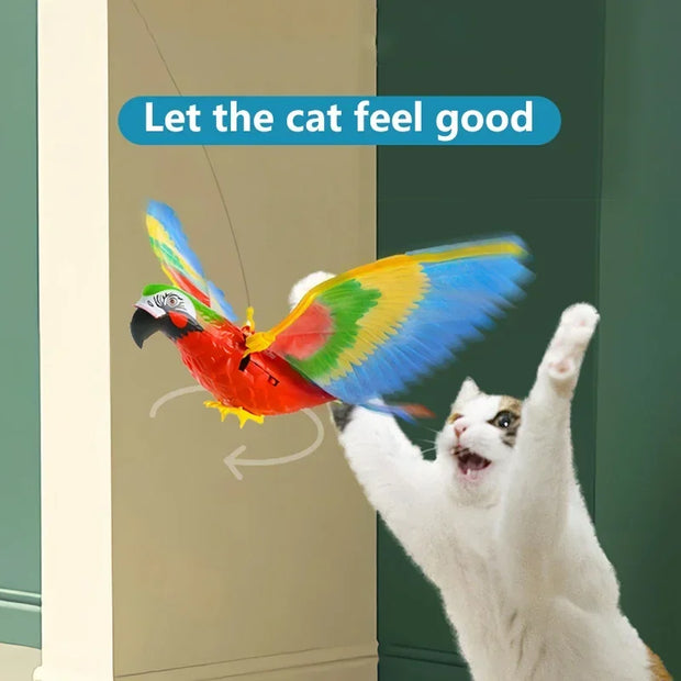 Cat playing with a colorful Electric Flying Bird Cat Toy, with text 'Let the cat feel good' above.