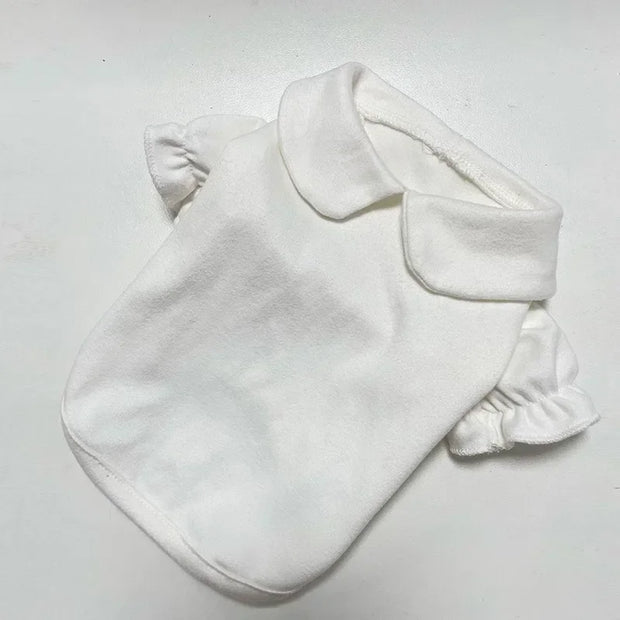 White Puppy Bow Dress Set with ruffled edges on a light gray background