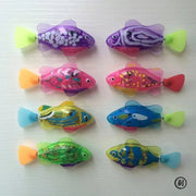 Colorful Interactive Electric Swimming Fish Toys on a white background