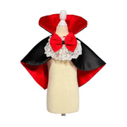 Mannequin wearing a red and black Vampire Pet Costume with a white bow on a white background