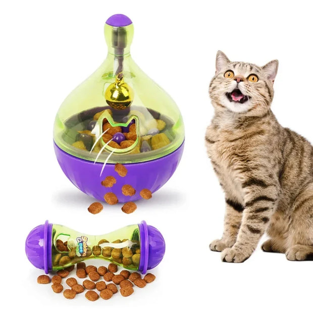 Shaking Q Pet Treat Dispenser Toy and a cat interacting with it on a white background
