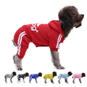 Dog wearing a red Sporty Pet Hoodie Jumpsuit with white stripes on a white background