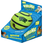 Wobble Wag Giggle Ball Fun Dog Toy packaging with a green ball and blue box.