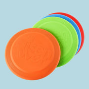 Set of colorful Aisenwer Durable Rubber Dog Frisbee on a light blue background