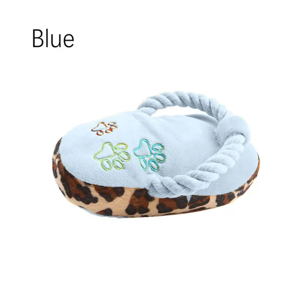 Blue Plush Slipper Dog Toy with leopard print base on a white background