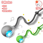 Gray and green Rechargeable pet Toy Ball with Mode and Obstacle Avoidance with USB cable and three mode options on a white background
