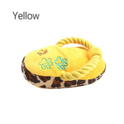 Yellow Plush Slipper Dog Toy with leopard print base and rope handle on a white background